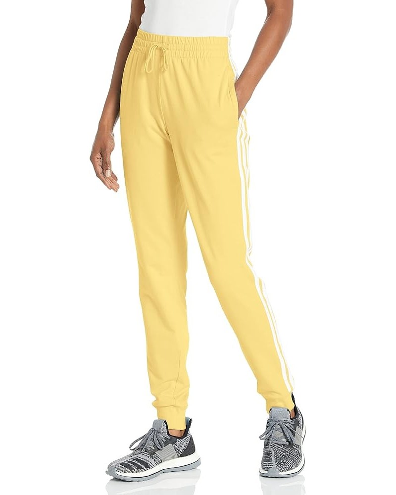 Women's Essentials Single Jersey 3-Stripes Pants Almost Yellow/White $17.40 Pants